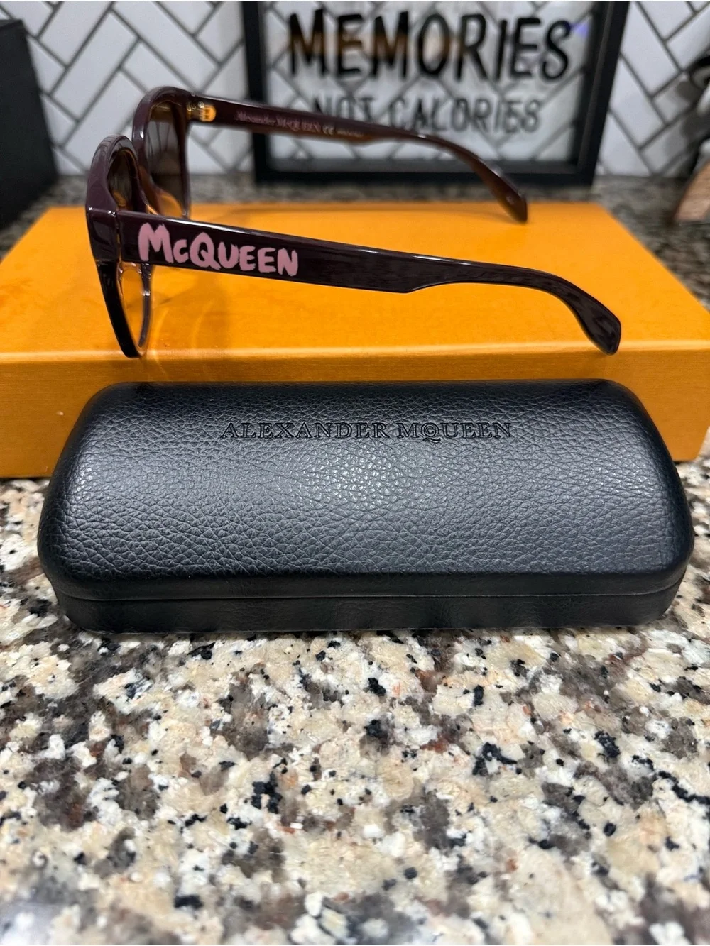 Alexander McQueen Women’s Purple Frame Sunglasses with Amber Lenses